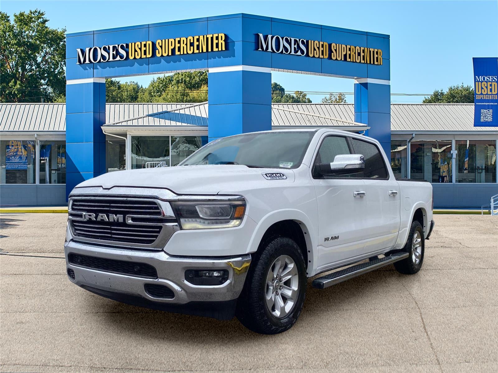 2020 RAM 1500 Laramie in Bright White Clearcoat — front three-quarter view
