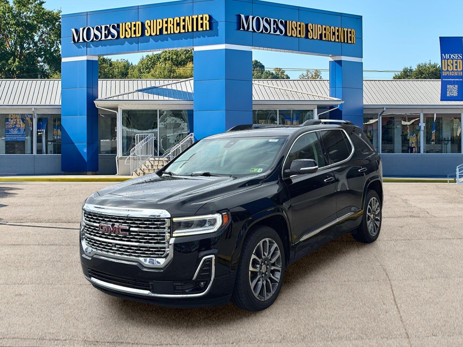 2021 GMC Acadia Denali in Ebony Twilight Metallic — front three-quarter view