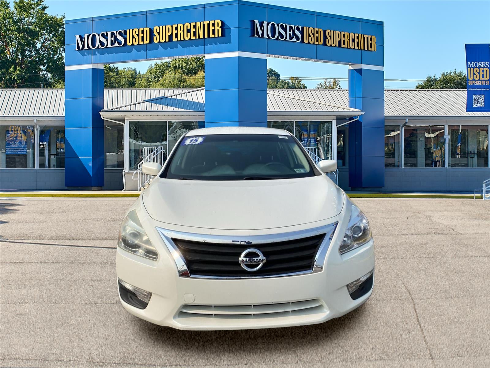 2015 Nissan Altima 2.5 S in Pearl White — front three-quarter view