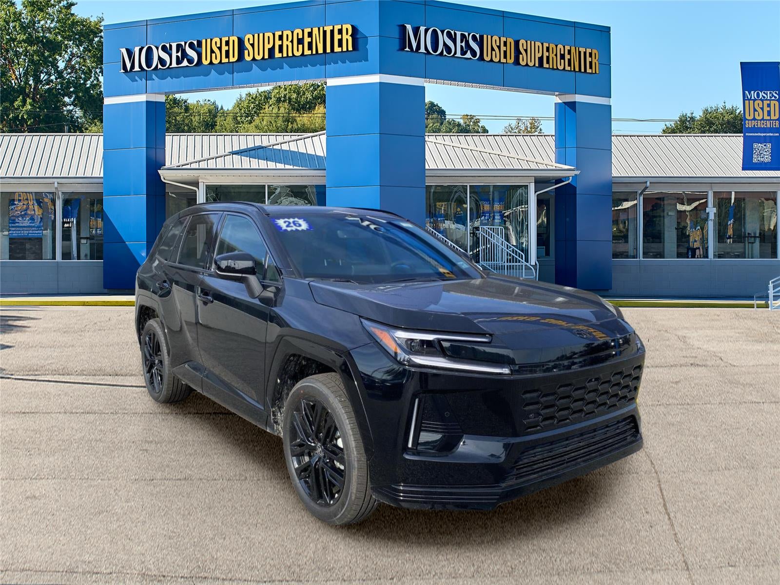 2026 Toyota RAV4 XSE in Midnight Black Metallic — front three-quarter view
