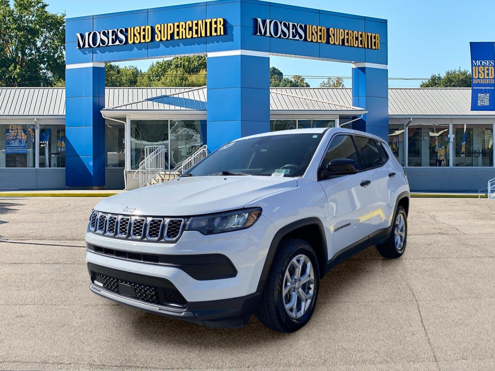 2024 Jeep Compass Sport in Bright White Clearcoat — front three-quarter view
