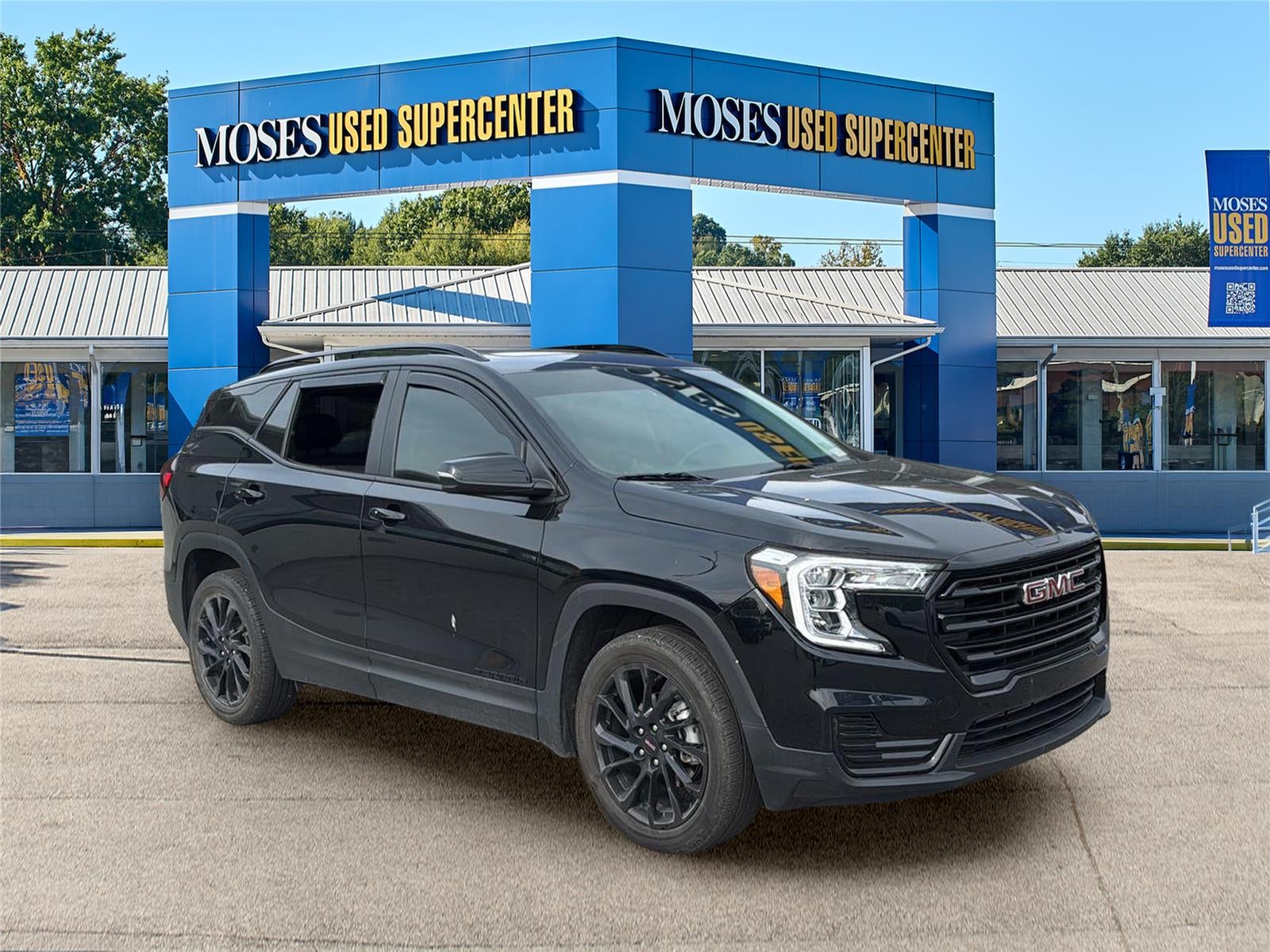 2024 GMC Terrain SLE in Ebony Twilight Metallic — front three-quarter view