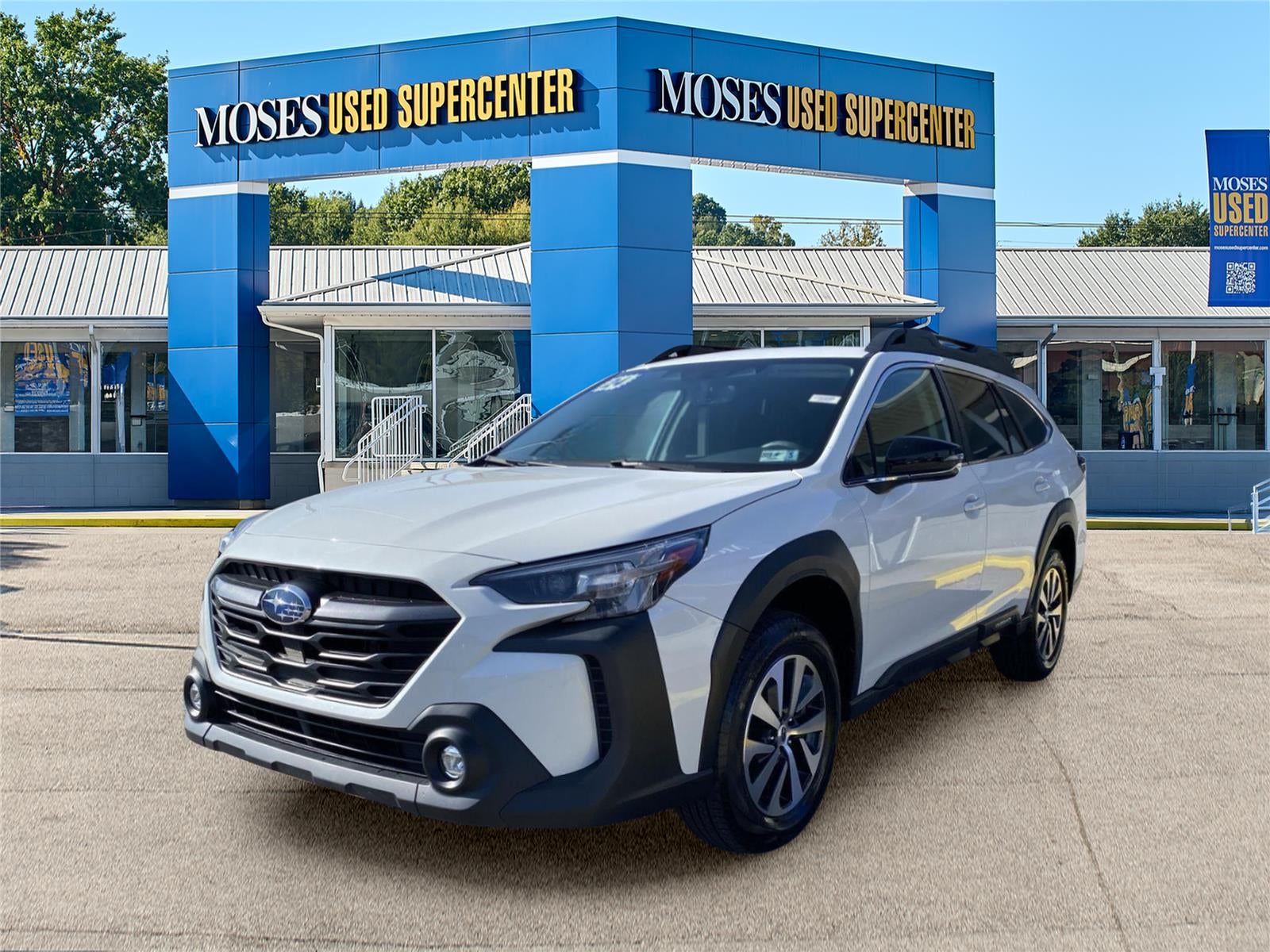 2024 Subaru Outback Premium in Crystal White Pearl — front three-quarter view