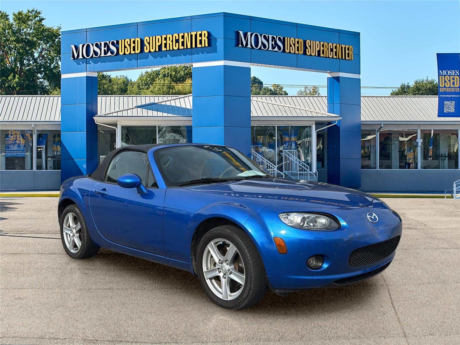 2006 Mazda Mazda MX-5 Miata Touring in Winning Blue Metallic — front three-quarter view