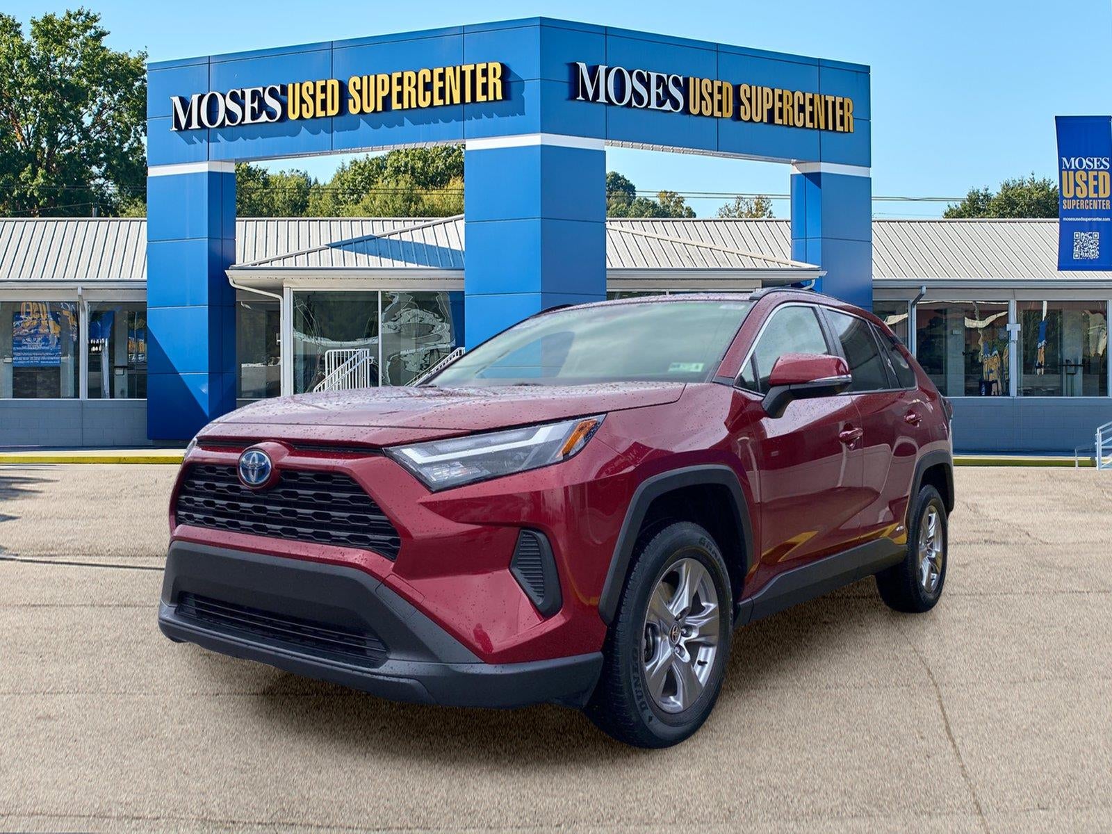 2023 Toyota RAV4 Hybrid XLE in Ruby Flare Pearl — front three-quarter view